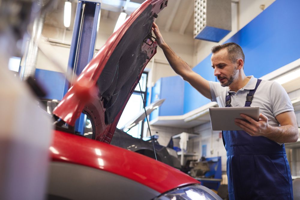 Car undergoing WOF inspection at Kapiti Cars Workshop